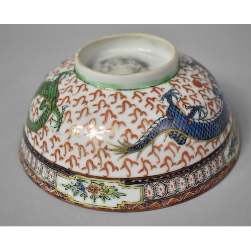279 - A Chinese Porcelain Bowl in the Famille Verte Palette Decorated with Green and Blue Dragons Amongst ... 