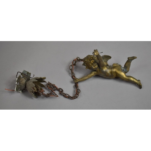 13 - A Continental Bronzed Ceiling Light Fitting in the Form of a Flying Cherub, 20cm high