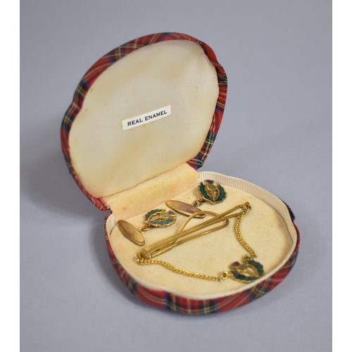 25 - A Cased Suite of Scottish Gents Jewellery to include Cufflinks and a Tie Pin, Thistles