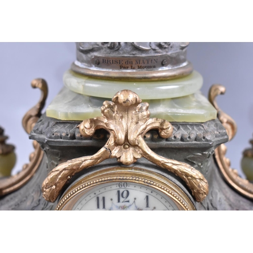 32 - A French Figural Bronzed Spelter Clock Garniture, the Centre 