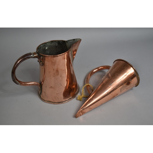 36 - A 19th Century Copper Jug, 18cm high Together with a Conical Ale Warmer