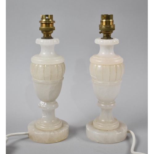 38 - A Pair of Carved Alabaster Vase Shaped Table Lamps, 25cm high