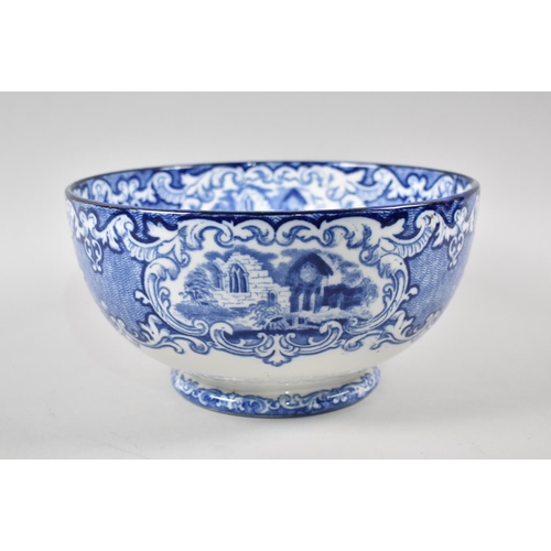 40 - A Transfer Printed Blue and White Abbey Pattern Bowl, 25.5cm Diameter