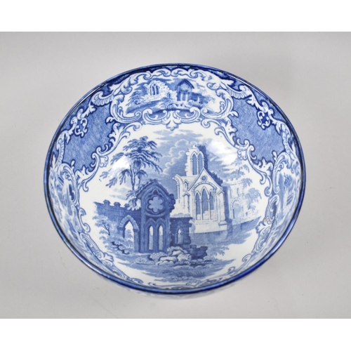 40 - A Transfer Printed Blue and White Abbey Pattern Bowl, 25.5cm Diameter