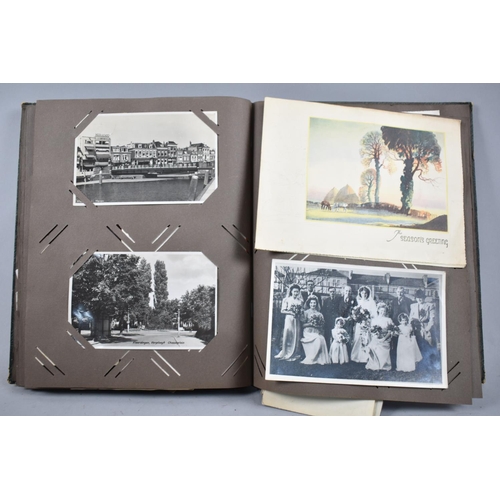 46 - A Vintage Postcard Album Containing Postcards and Photographs, Greetings Cards etc