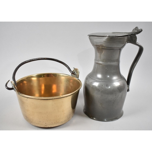 51 - A Pewter Lidded Jug and a Small Brass Jam Kettle