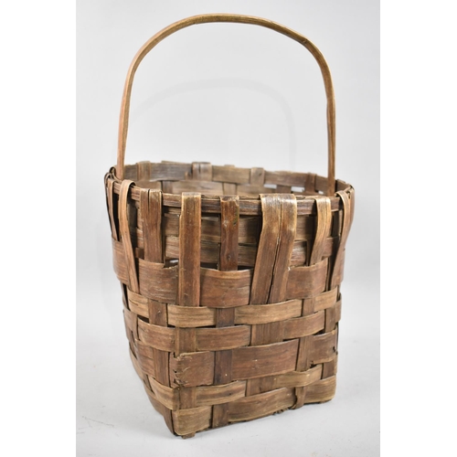 54 - A Vintage Woven Flower Basket, 44cm high