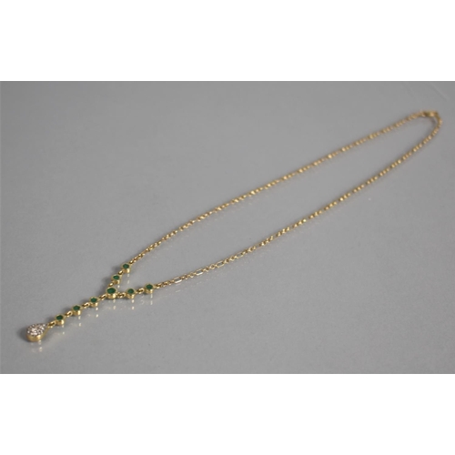 30 - An Italian 14ct Gold, Diamond and Emerald Lariat Necklace having Teardrop Shaped Diamond Cluster Dro... 