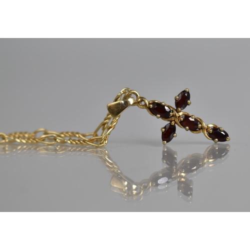 34 - A 9ct Gold and Garnet Crucifix Pendant on a 9ct Gold Continental Chain, 3gms, Crucifix 34mm drop