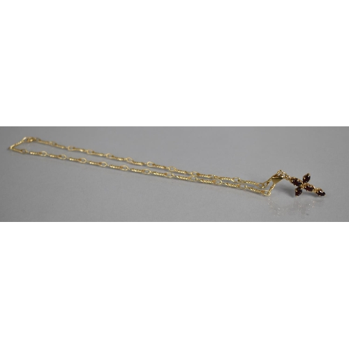 34 - A 9ct Gold and Garnet Crucifix Pendant on a 9ct Gold Continental Chain, 3gms, Crucifix 34mm drop