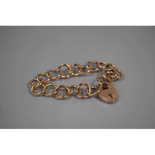40 - An Antique Rose Gold Coloured Metal (Tests as 9ct) Charm Bracelet. Unusual Large Circular Links to a... 
