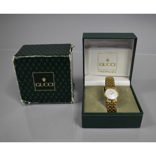 20 - A Ladies Gucci Wrist Watch, Model 3400L, Mother of Pearl Dial and Gold Coloured Hands, Face Inscribe... 