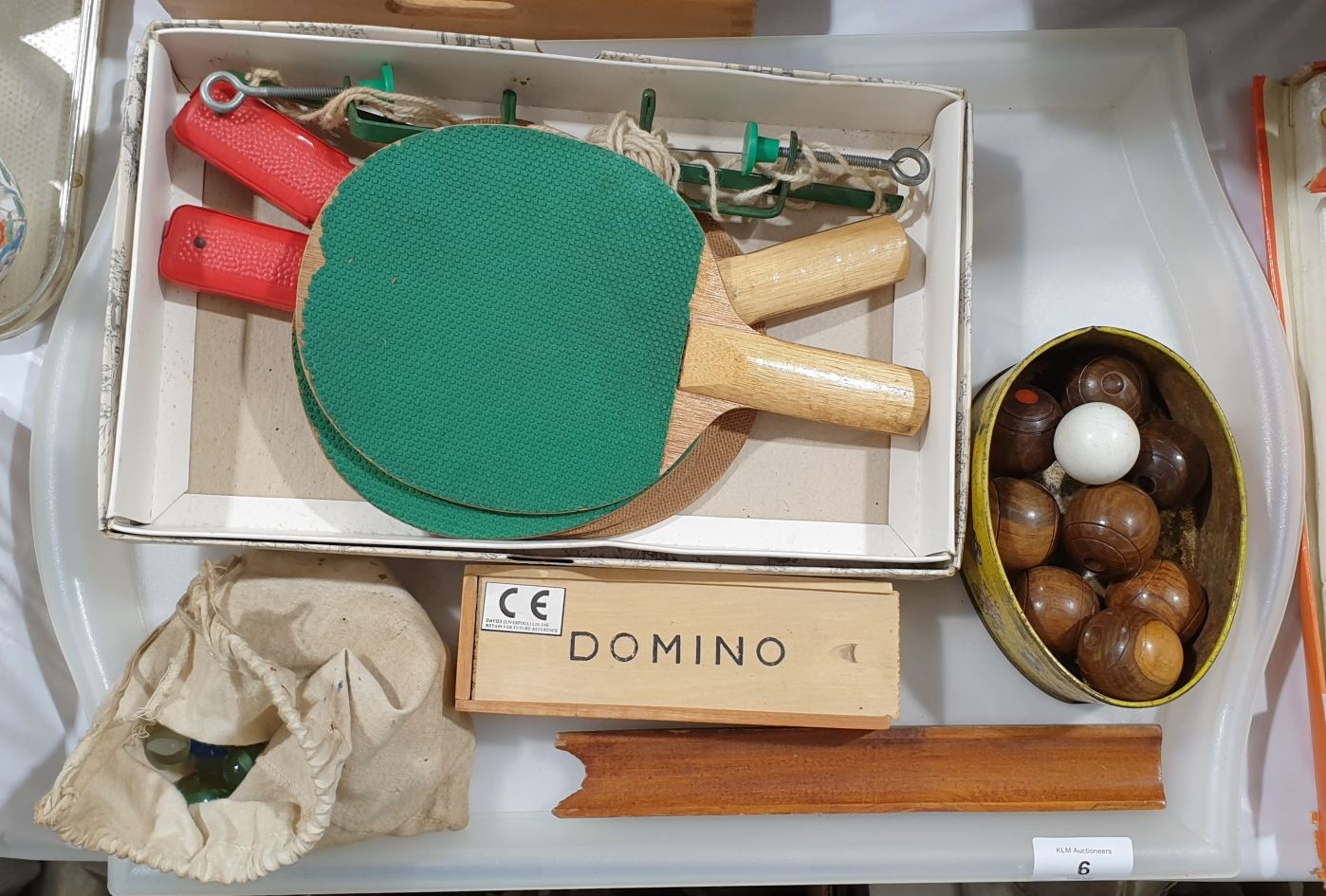 A set of vintage wooden table bowls and other games.