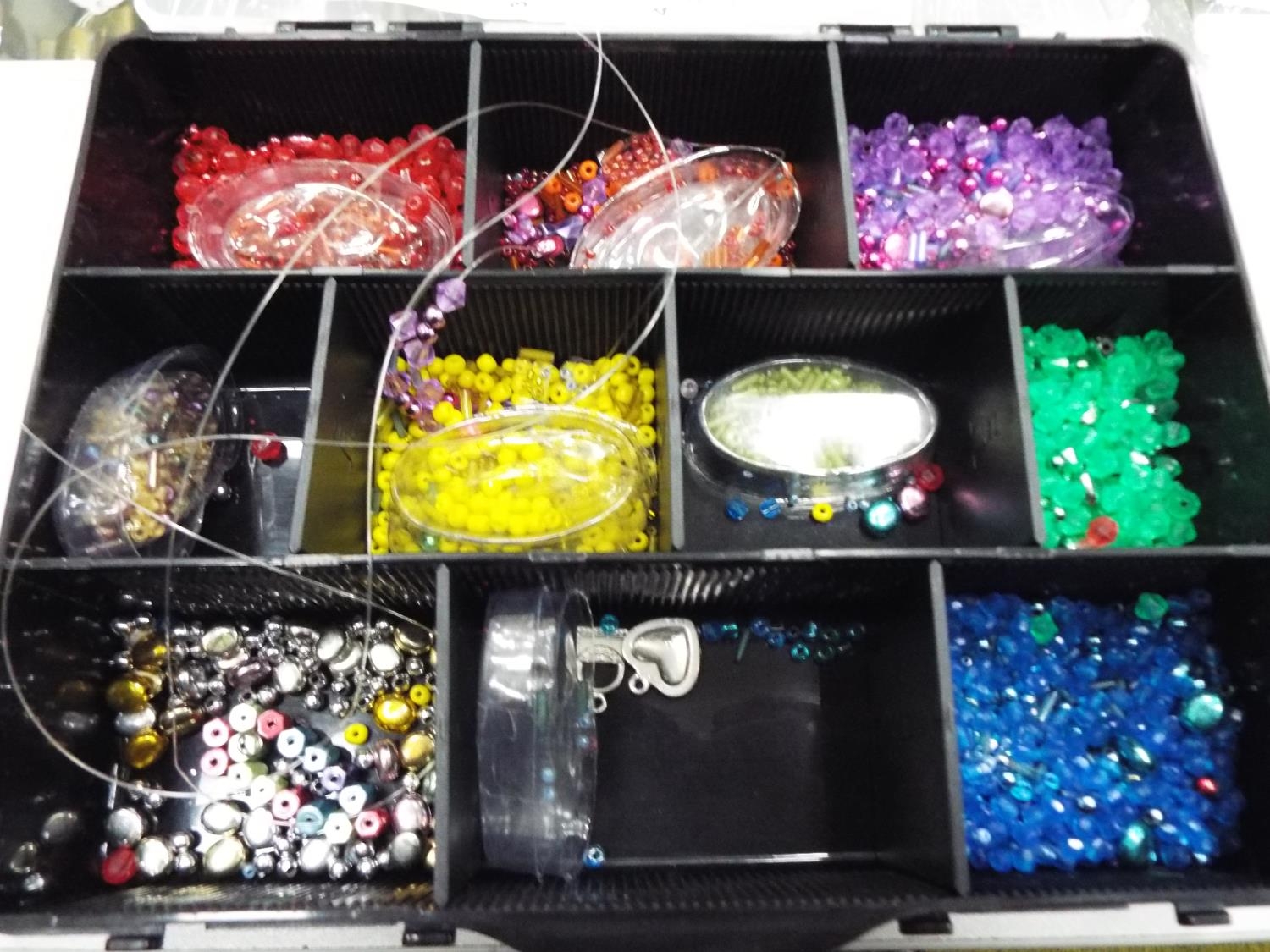 Tray of assorted beads for craft or jewellery makers