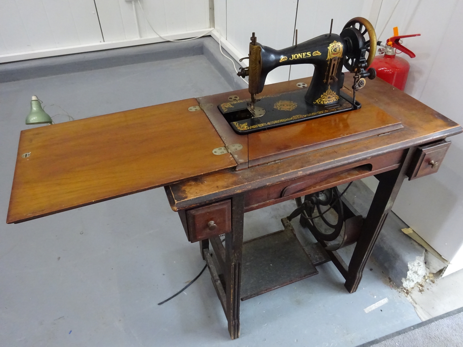 Vintage Jones sewing machine with table