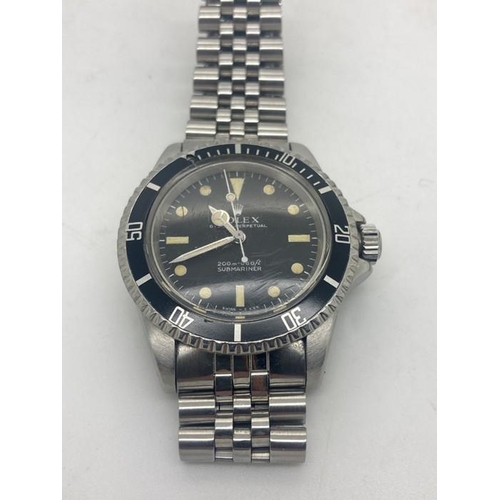 522 - A Gentleman's Rolex Oyster Perpetual Submariner stainless steel automatic wrist watch in working ord... 