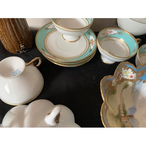 51 - Ceramics including Noritake coffee service, 2 small blue/white plates, two Elsi Bourelius Swedish po... 