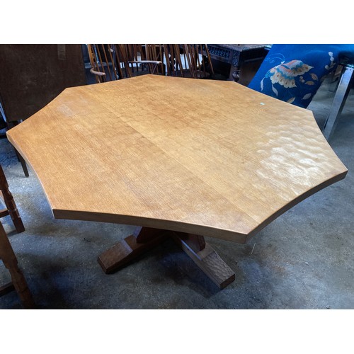 1261 - A large Robert ''Mouseman'' Thompson Oak octagonal adzed top and sides table with curved edges to to... 