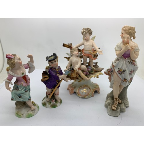 57 - Four late 19thC/early 20thC Continental porcelain figures to include a pair Of Samson. Tallest 13cms... 