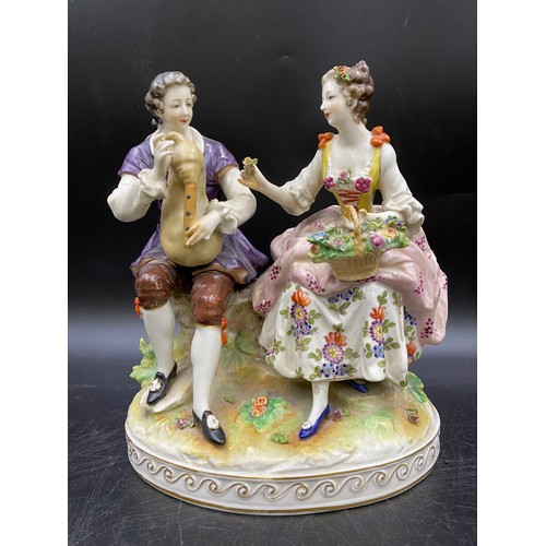 58 - A Continental porcelain figurine with Augustus Rex Meissen mark to base circa 1900. 23cms h.