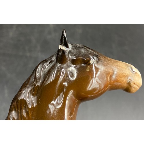 25 - A Beswick horse collection comprising: dapple grey shire horse 17cms h, brown shire 20cms h, wall mo... 