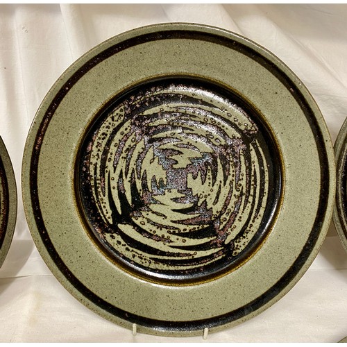 31 - A collection of 6 David Lloyd Jones studio pottery dinner plates 29.5cms d with brown circular swirl... 