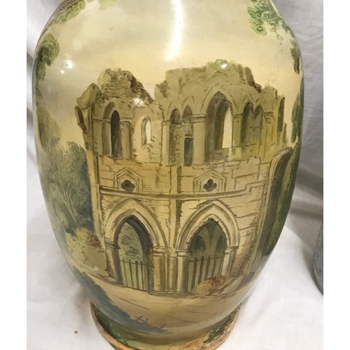 10 - A Victorian large hand painted vase, 65cms h painted with cottage scene and ruin Abbey together with... 