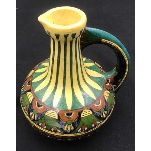 4 - Decorative pottery jug Faience de Purmerende Hollande, numbered 1023 to the base. 18cm h.