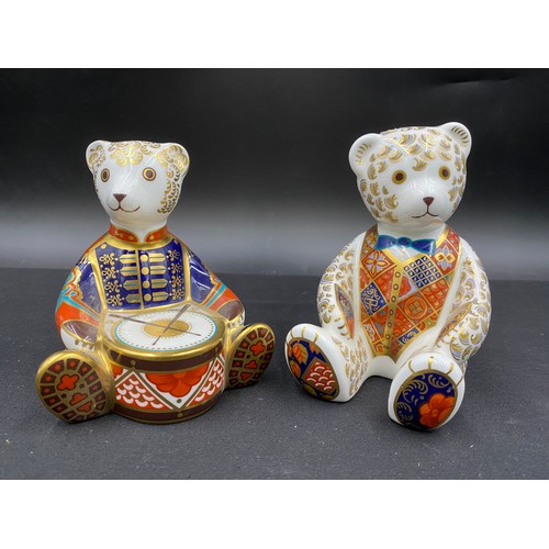 9 - Two Royal Crown Derby Teddy Bears; Drummer Bear with gold coloured stopper 10cm h and Bear with blue... 