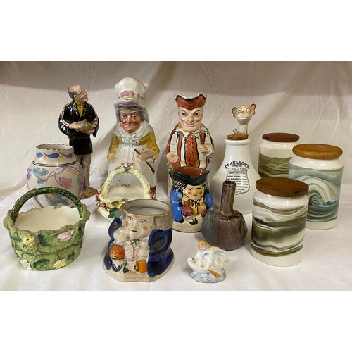 15 - A selection of ceramics to include Toby jugs tallest with lid 28cm, smallest Devon Tors 12cm, Collar... 