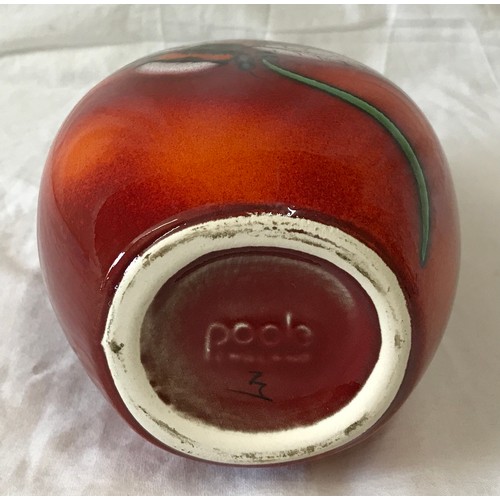 30 - A Poole Pottery vase with Bee decoration to front on a red and orange glazed background. 25cms h.