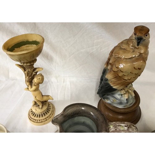 45 - A mixed lot of ceramics to include a eagle on wooden stand 30cms h, 6 x jugs by Portmeirion, Crown D... 