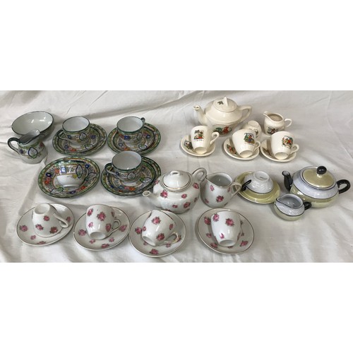 55 - Four assorted children's part tea sets, green border floral pattern 13 piece, Nursery rhyme 9 piece,... 