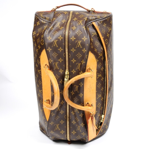 LOUIS VUITTON - a Monogram Eole 50 rolling duffle bag. Designed with maker&#39;s monogram coated canvas