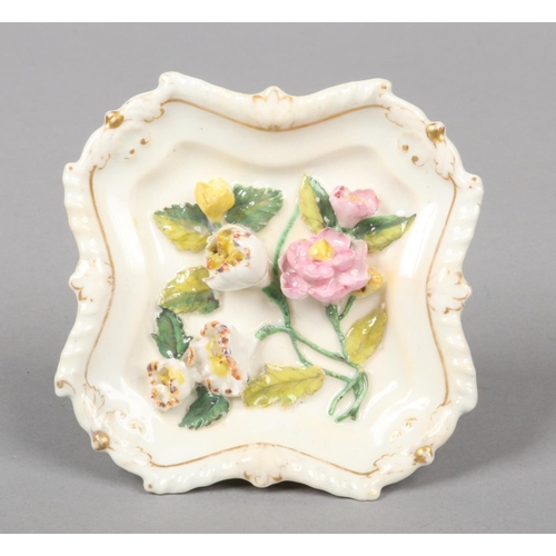 25 - A Rockingham square pin tray with indented sides and having gadroon and acanthus moulded rim. Applie... 