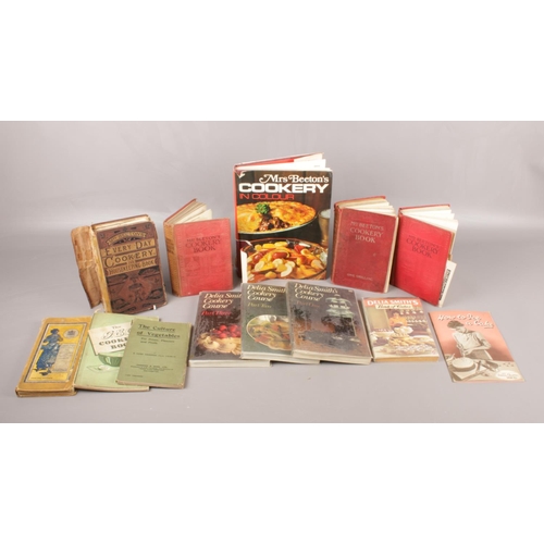 12 - A selection of vintage cookery books. To include five Mrs Beeton's books, four Delia Smith's and a '... 