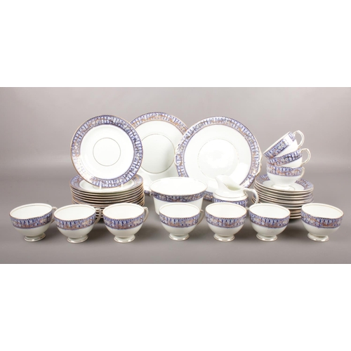 35 - A thirty eight piece BPC Ltd part tea set. To include ten cups, eleven saucers, two serving plates, ... 