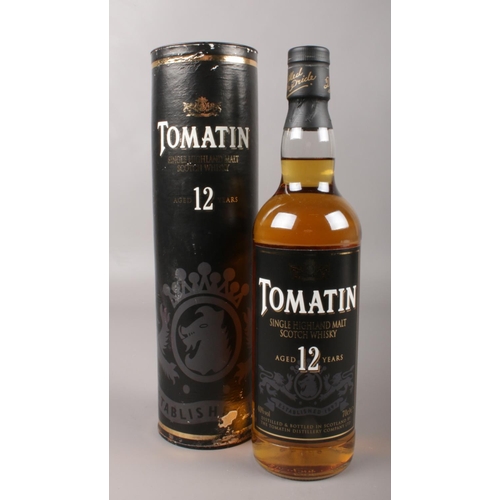 5 - A bottle of Tomatin single Highland malt scotch whisky. Aged 12 years, 70cl. In presentation tube.
