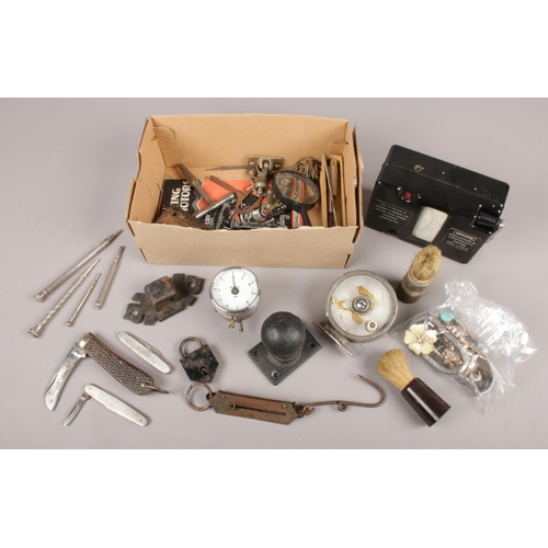 51 - A box of collectables. Includes costume jewellery, propelling pencils, pen knives etc.