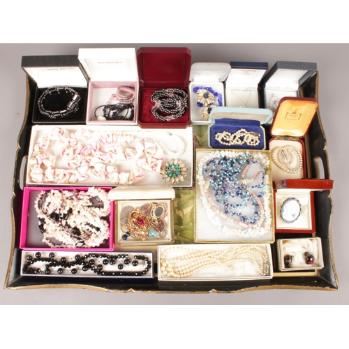 37 - A tray of boxed costume jewellery. Including pearls necklaces, beads, etc.