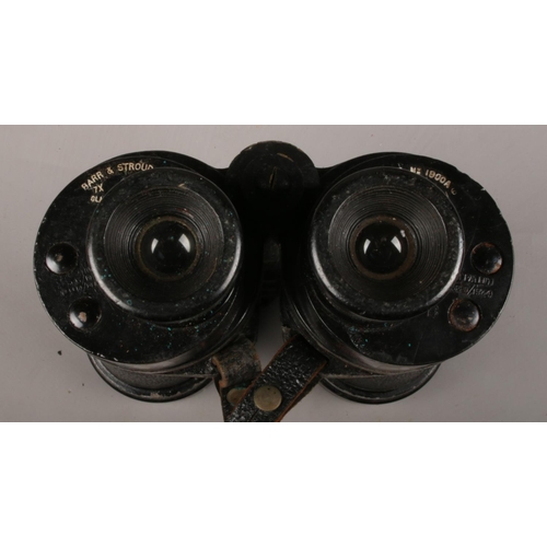 38 - Two cased pairs of binoculars. To include a WW2 pair of Barr & Stroud Royal Navy Binoculars no 85216... 
