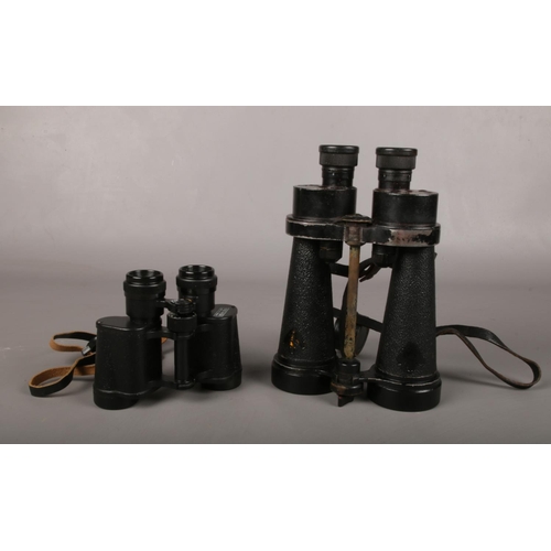 38 - Two cased pairs of binoculars. To include a WW2 pair of Barr & Stroud Royal Navy Binoculars no 85216... 