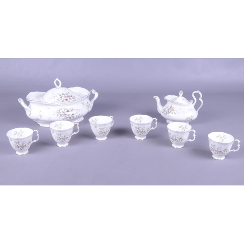 51 - A Royal Albert Haworth pattern part set. To include a teapot, lidded tureen and six cups.
