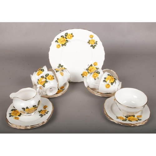 7 - A Royal Vale Yellow Rose Part Tea Service. Includes Cups, Saucers and Side Plates