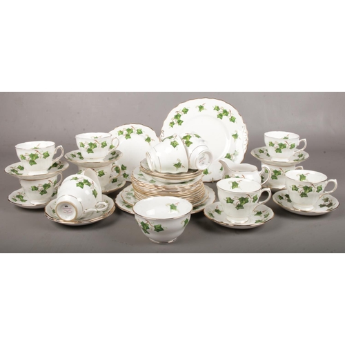8 - A Colclough tea set. cups/saucers, milk jug, sugar bowl, plates, cake stand.