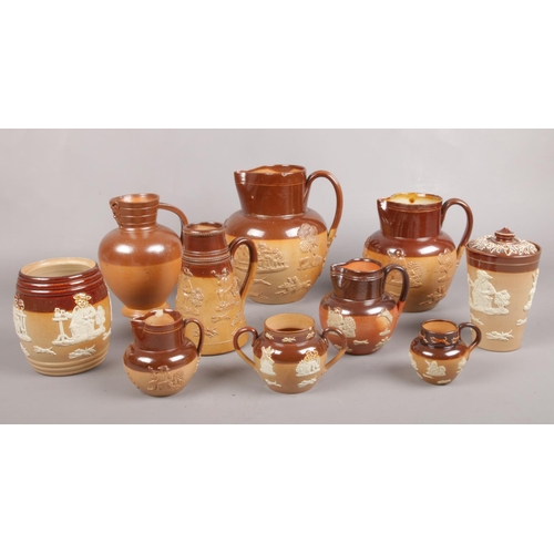 17 - A collection of Royal Doulton salt glazed stoneware. Various jugs, lidded vase etc