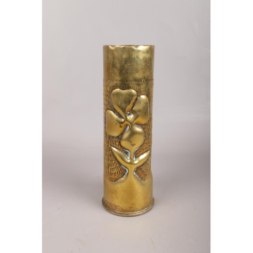 23 - A WWI Brass Artillery Shell, decorated with a Shamrock to the front. Stamped 1916 on the Base. Heigh... 