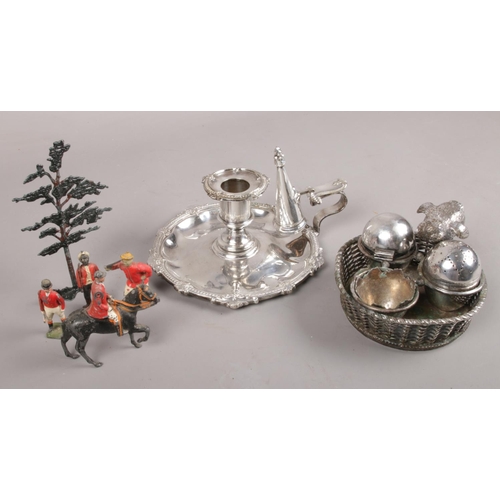 24 - A small quantity of metalwares. Including Mappin & Webb cruet set with mounted bird, chamber candle ... 