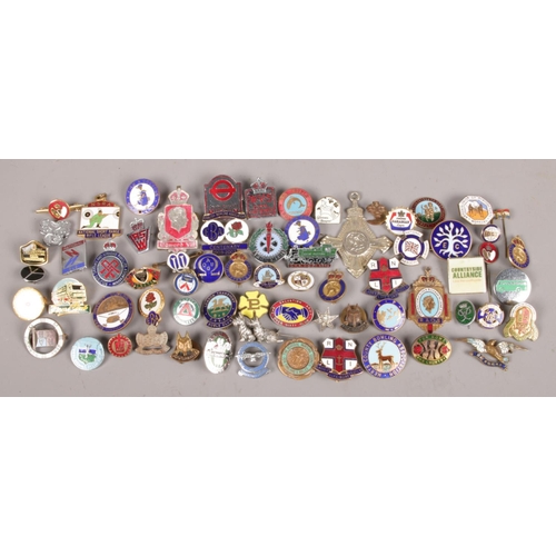 41 - A Series of Vintage Enamel Badges.