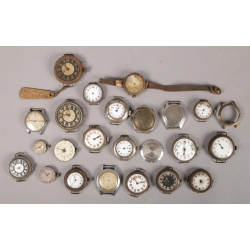 51 - A box of vintage trench watch type watch heads.